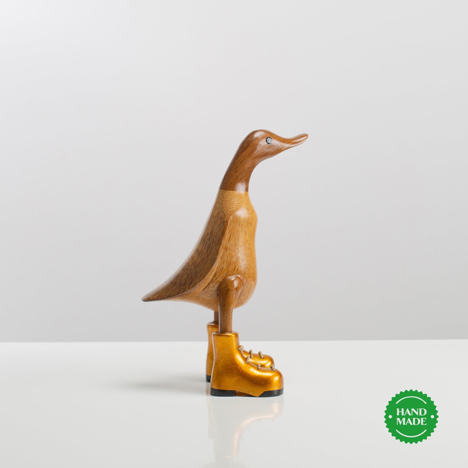 Ente aus Holz "Gestiefelt" (Gold)