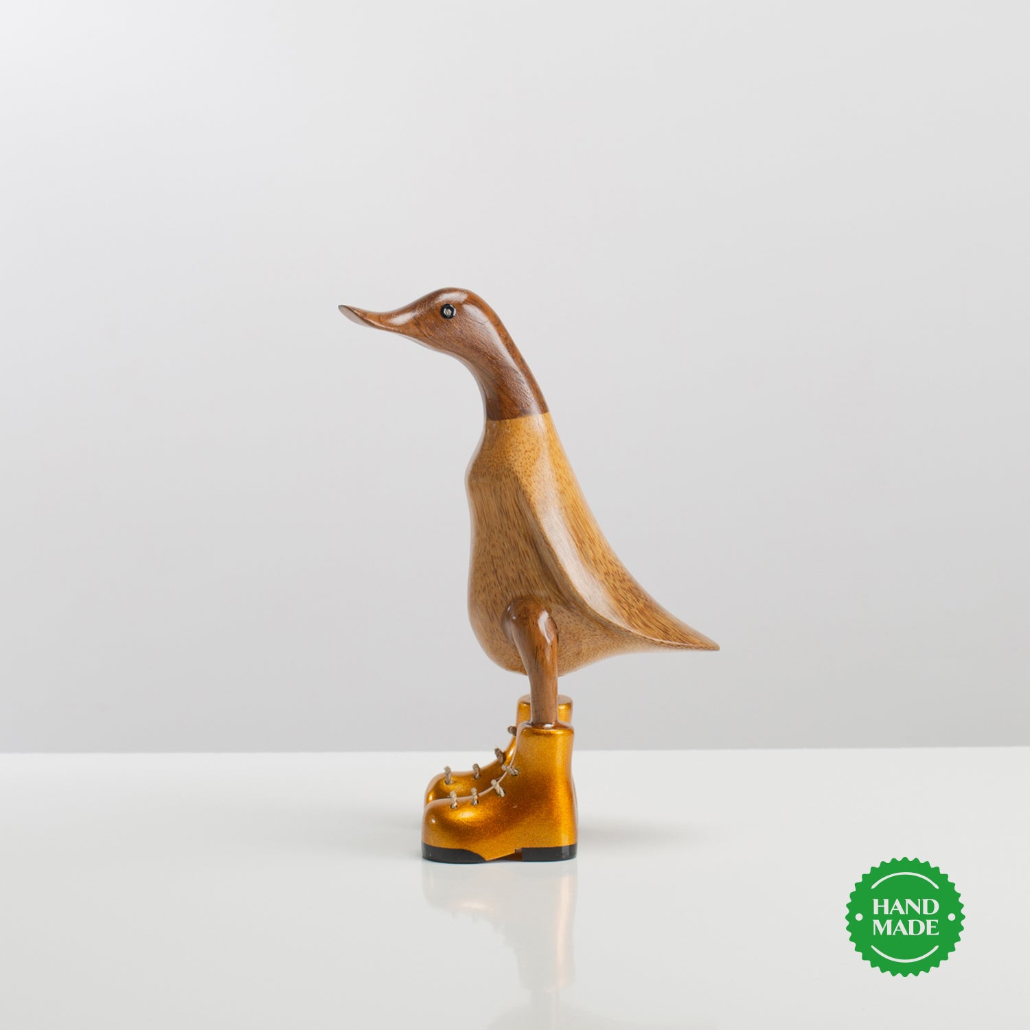 Ente aus Holz "Gestiefelt" (Gold)