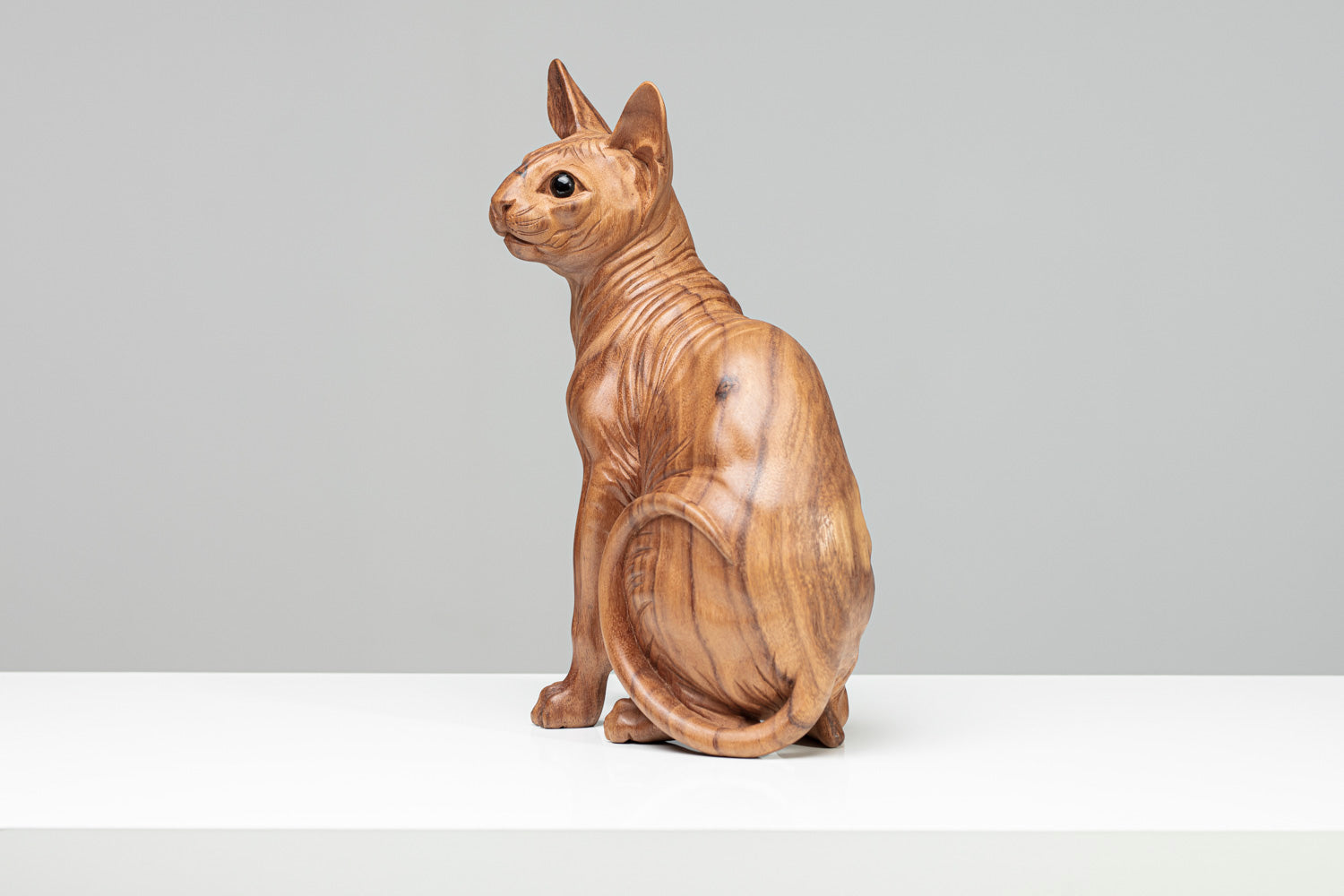 Holzskulptur "SPHYNX" Katze sitzend | Vollholz